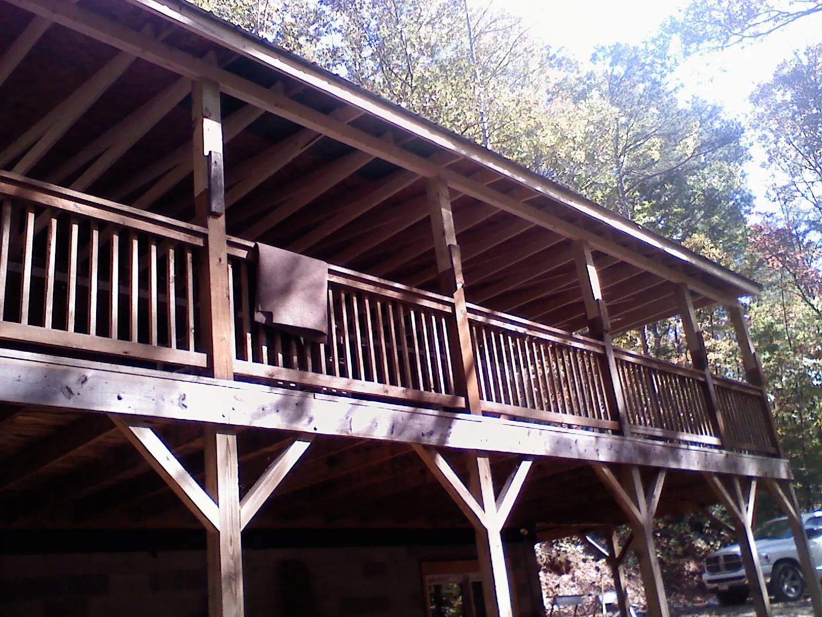 Timber framing under a new elevated porch and deck — Roof Leak Repair in Middle Village by Roofing Brothers